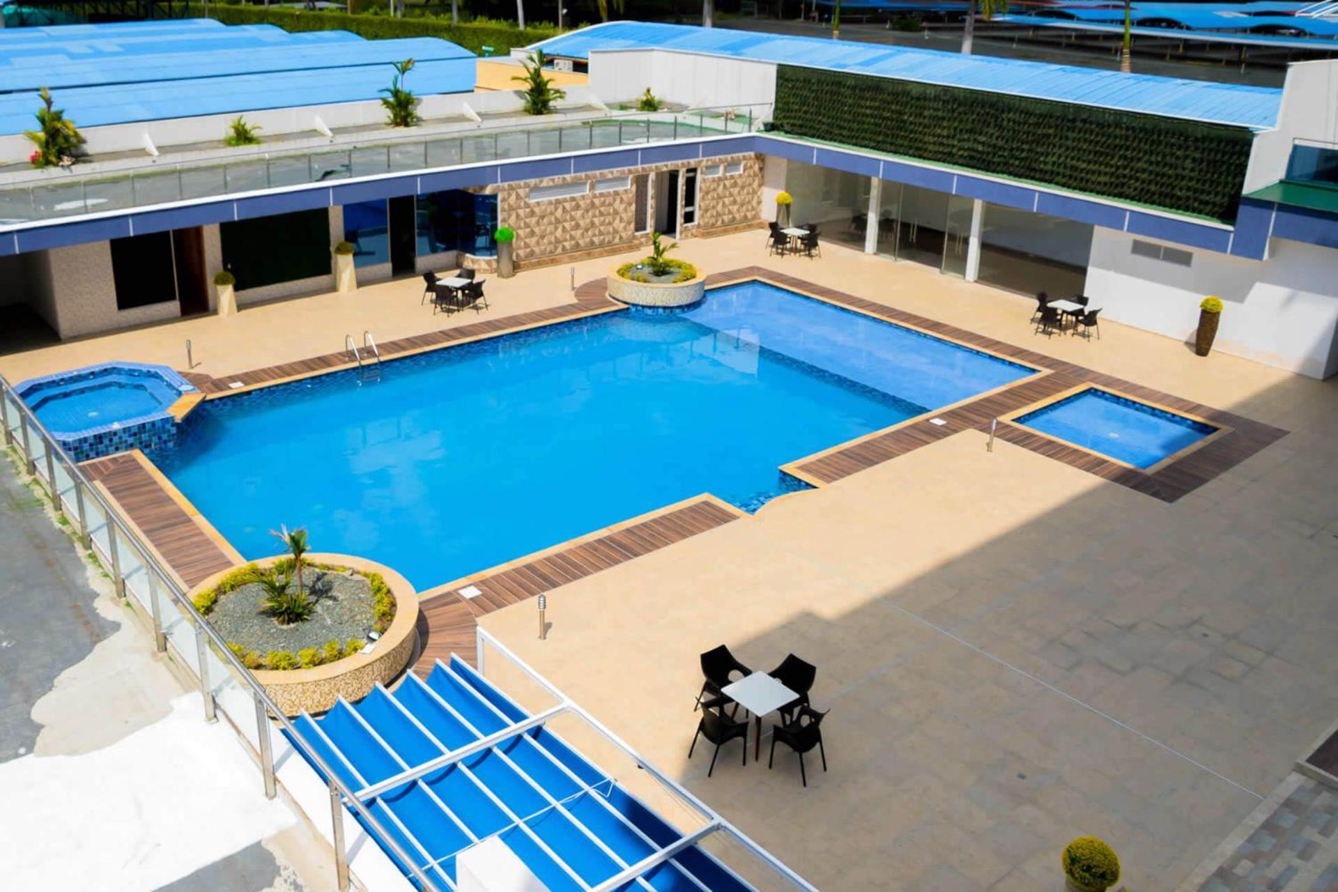 Hotel Royal Elim International San Antonio  Exterior photo The pool at the hotel