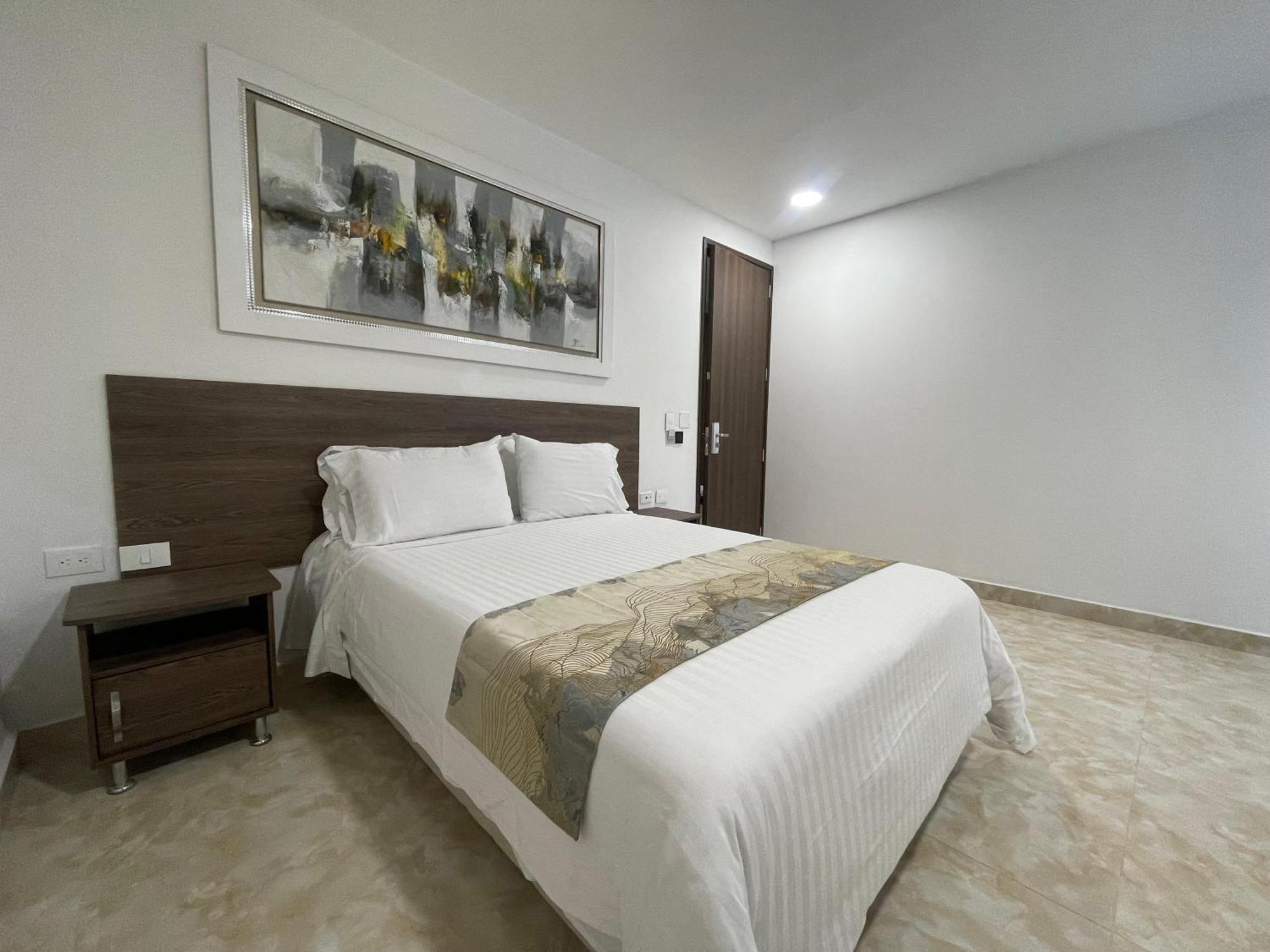 Hotel Royal Elim International San Antonio  Exterior photo A bedroom in a hotel