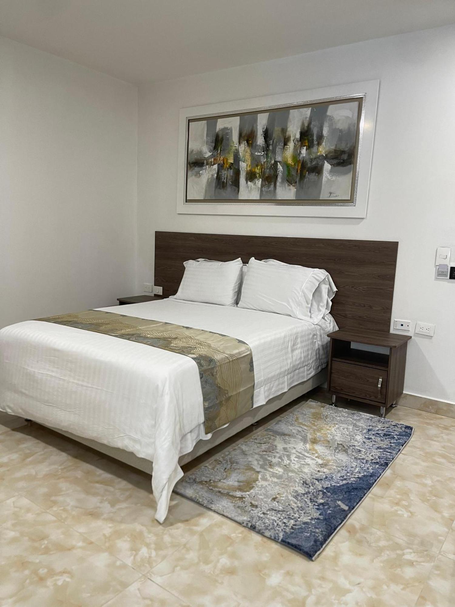 Hotel Royal Elim International San Antonio  Exterior photo A bedroom at the hotel